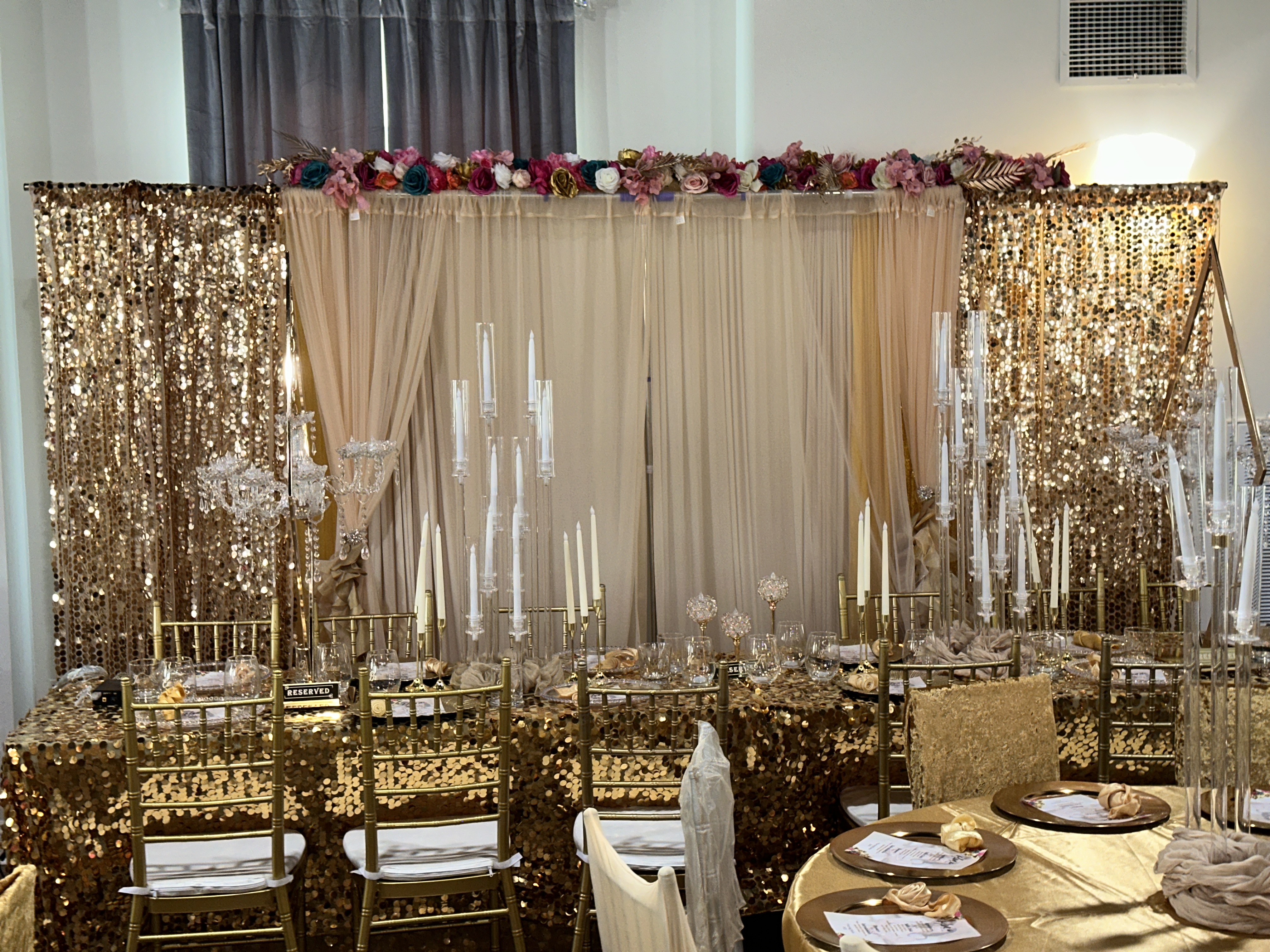 Gold sequin backdrop & sweetheart table