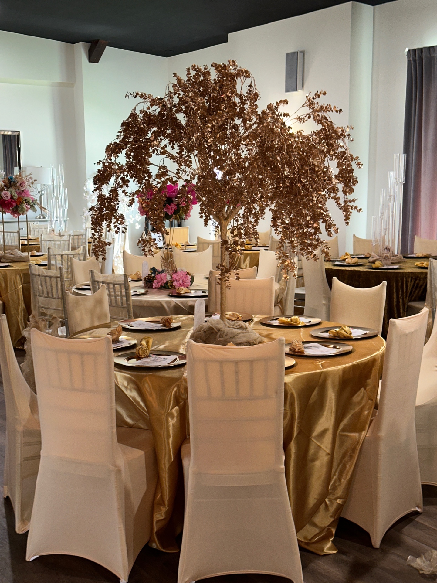 Gold tree centerpiece in venue
