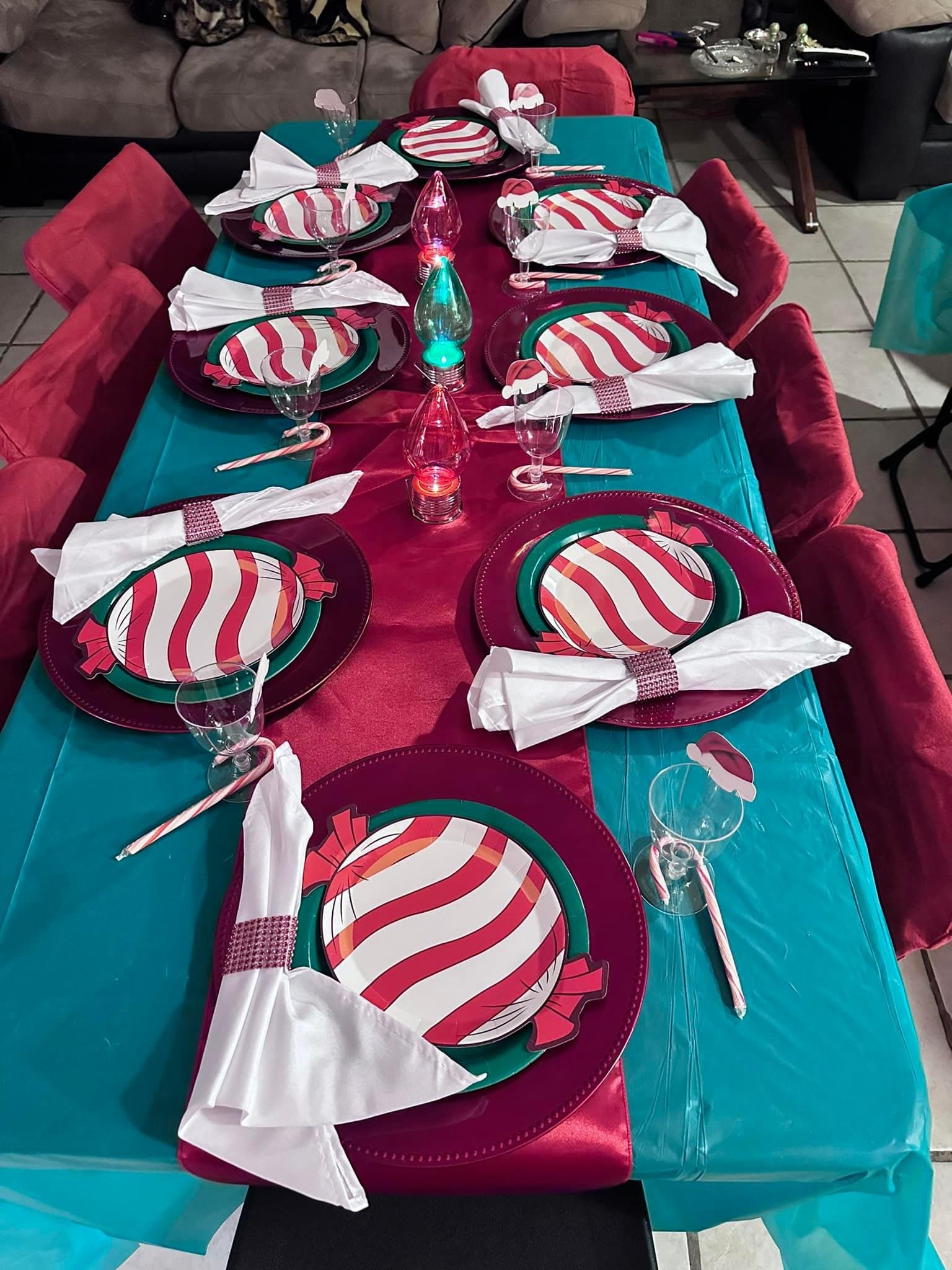 Christmas candy cane table setting with teal & red linens
