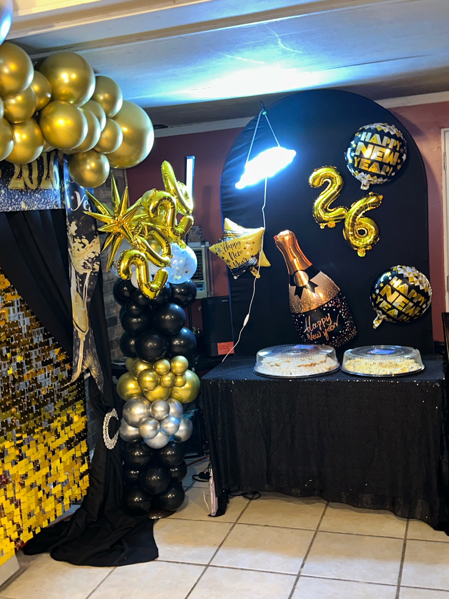 New Year 2026 black & gold balloon column setup
